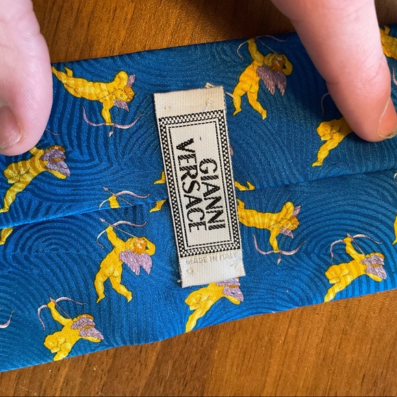 Blue Gianni Versace tie with Gold Cupid pattern. - Picture 4 of 5